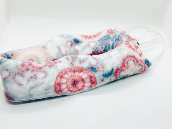 neck wrap with handles in blue and red medallion print