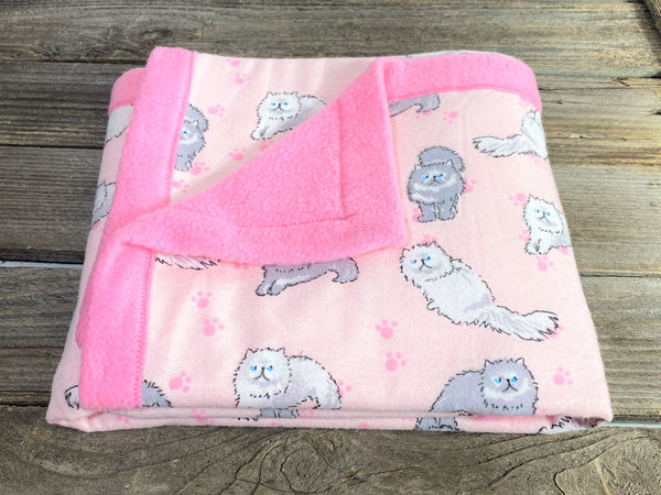 All purpose baby mat with gray and white long haired kitty cats and pink backing